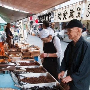Visit the Tsukiji fish market on the Japan budget tour
