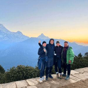 group tour hiking the nepal poonhill trek at sunset